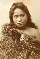maori girl with tiki